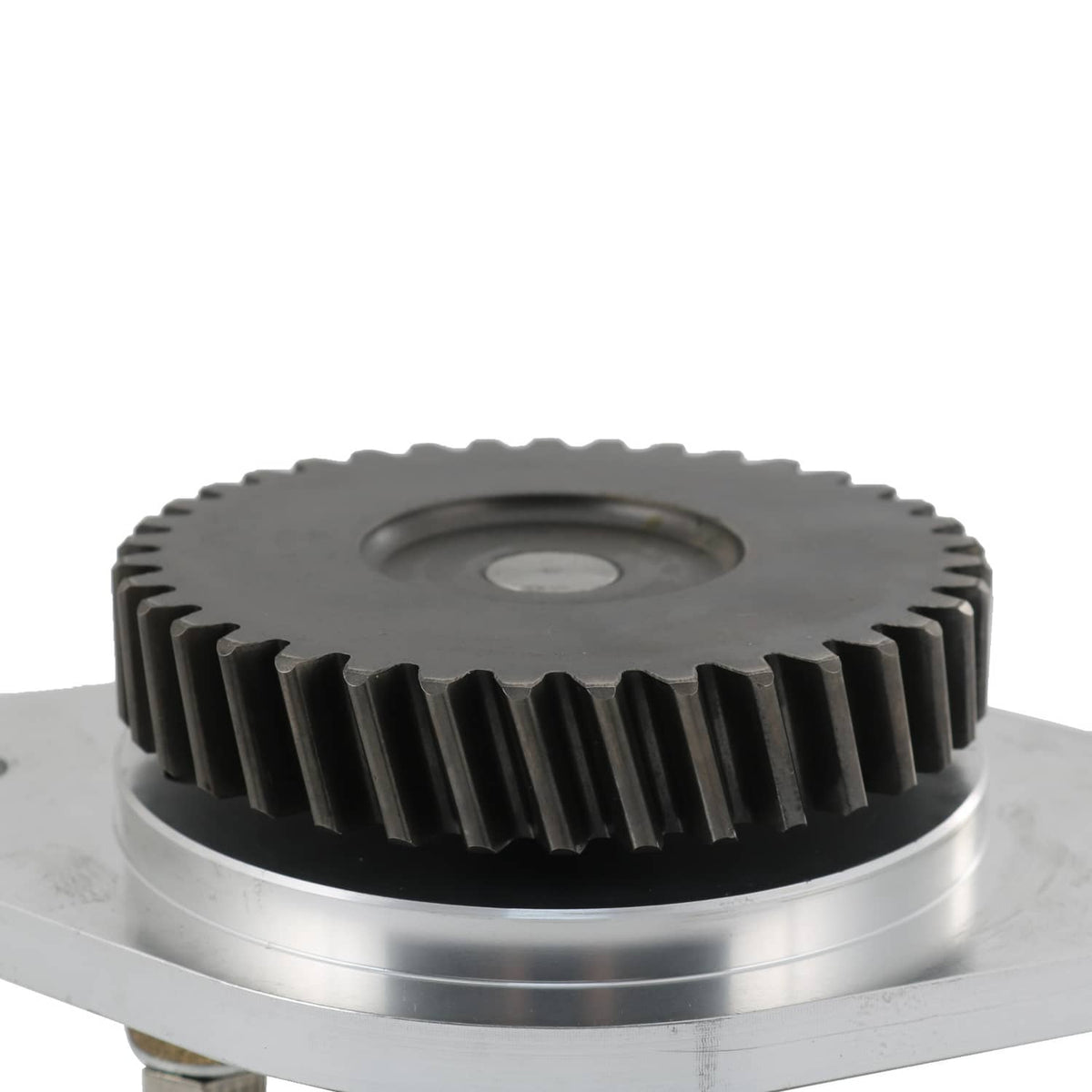 Raw water pump gear close-up showing toothed ring and central bolt head