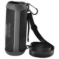 Waterproof silicone speaker case with carabiner strap, dark gray mesh texture.