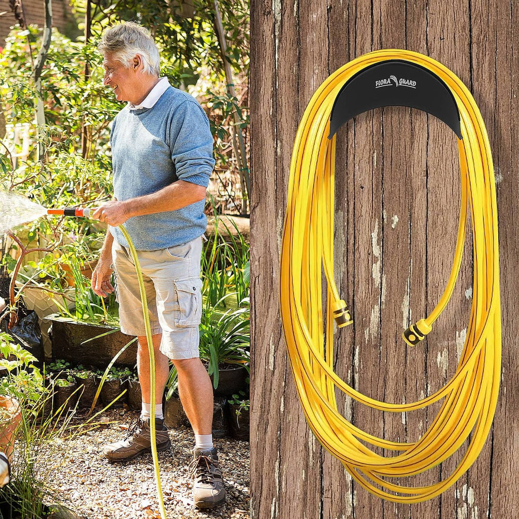 Black hose hanger with a coiled yellow garden hose, used outdoors