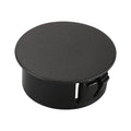 Black round plastic locking hole plug cover with built-in grip tabs