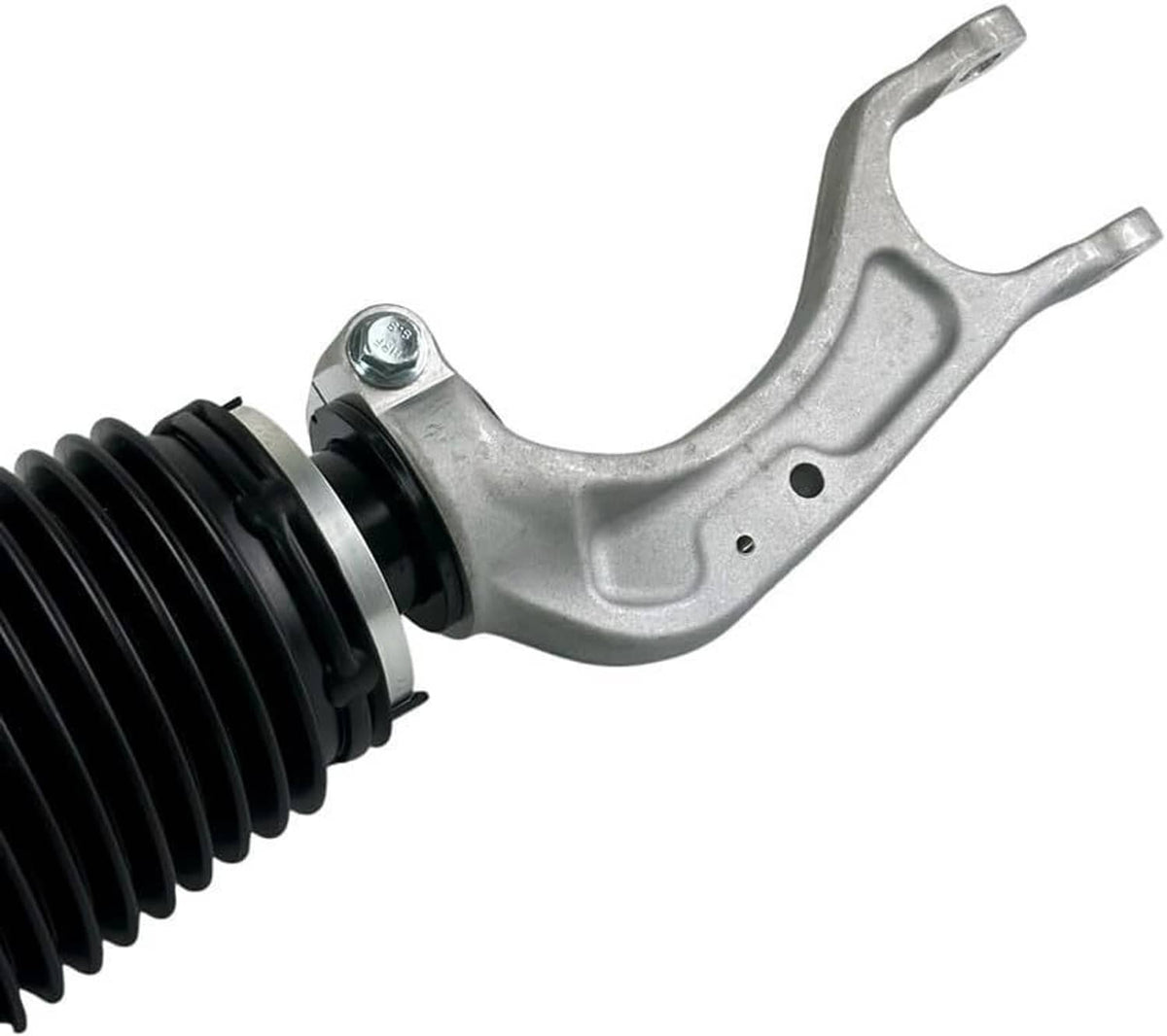 Front air suspension shock strut close-up of silver fork arm and black bellow sleeve.