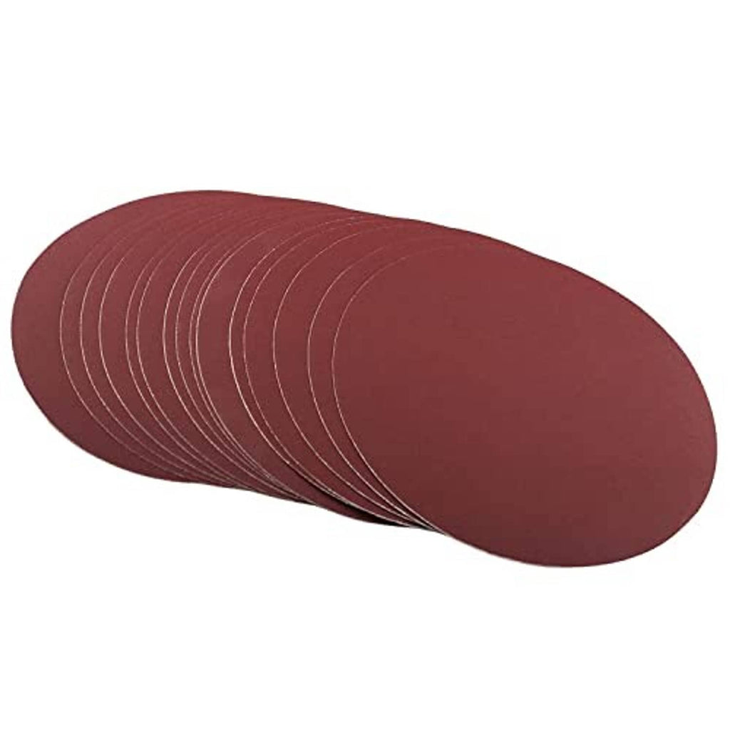 Red circular sanding discs, stacked, with fine abrasive texture