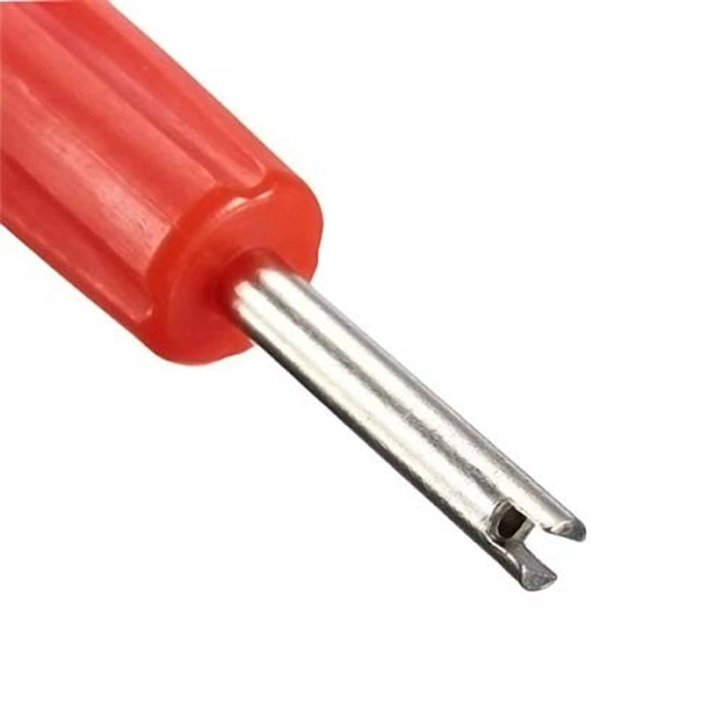 Close-up of red handle with silver forked tip for valve core removal