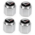 Silver metal tire valve stem cap with glossy black Corvette-style logo top