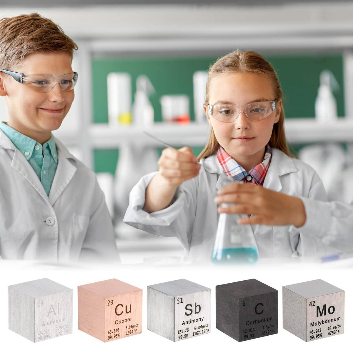 Set of metal element cubes including molybdenum cube, silver tone with Mo marking