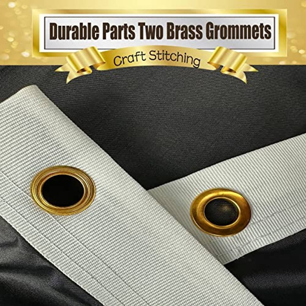 Black fabric flag corner with two brass grommets and reinforced stitching