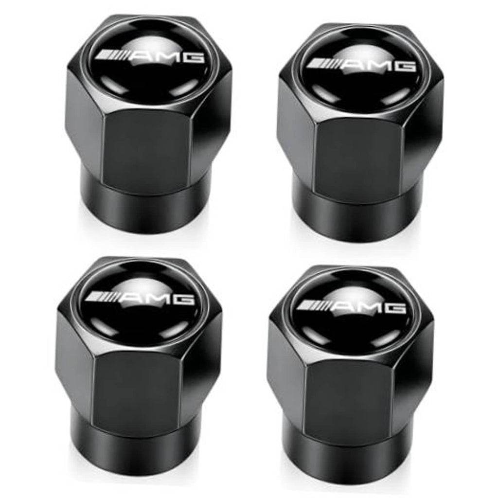 Black metal tire valve stem cap set with AMG logo, hexagonal top and rubber base