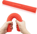 Red U-shaped resistance torsion bar held between hands
