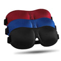 Set of three fabric sleep masks in black, blue, and red