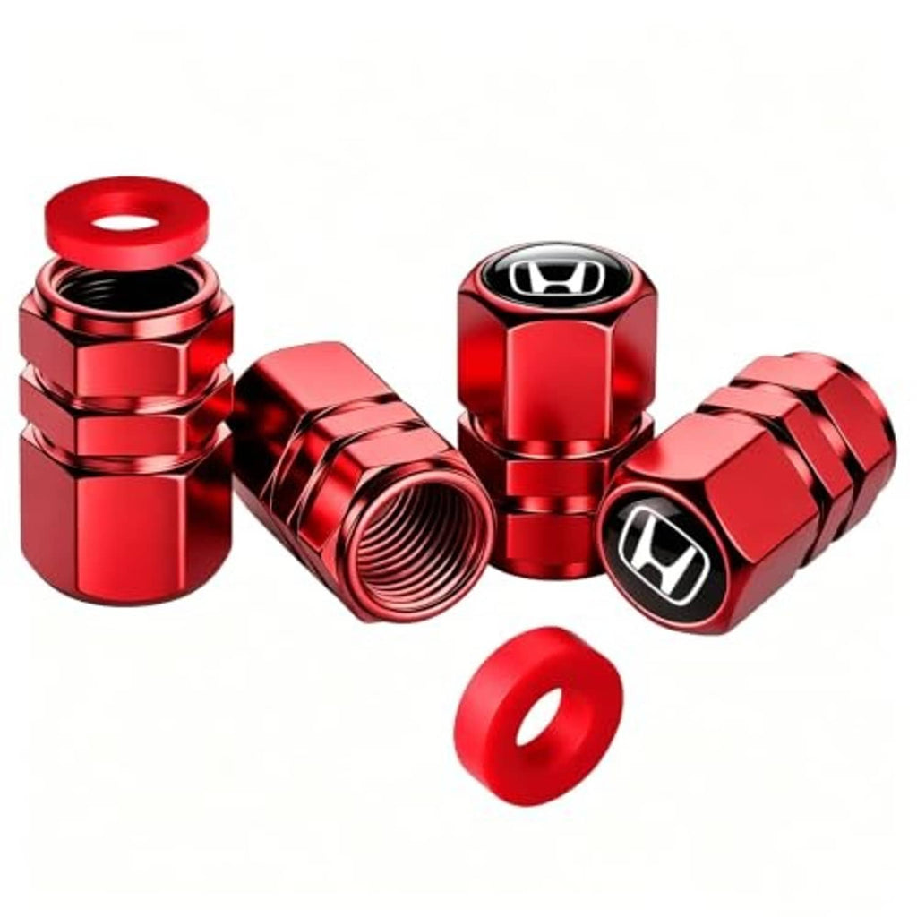 Red tire valve stem caps with Honda logo and matching rubber O-ring pieces