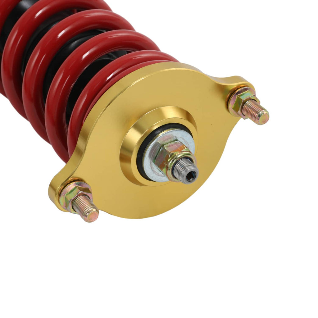 Adjustable coilover strut top plate in gold with red spring and mounting studs