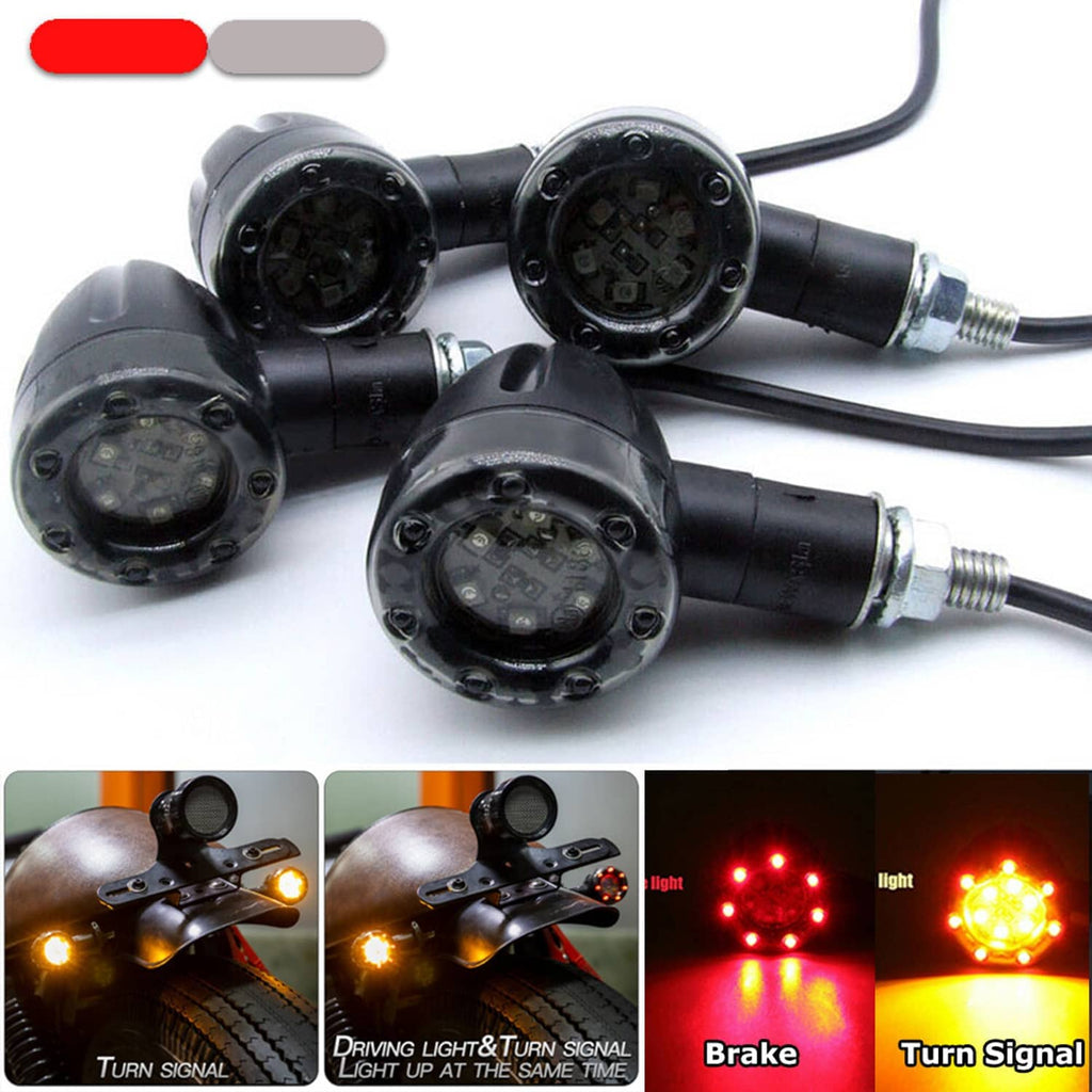 Four black LED motorcycle turn signals with smoked lenses and threaded mounting bolts
