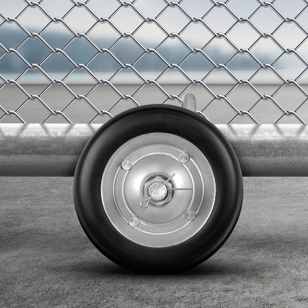 Close-up of black rubber caster wheel on steel sliding gate roller housing