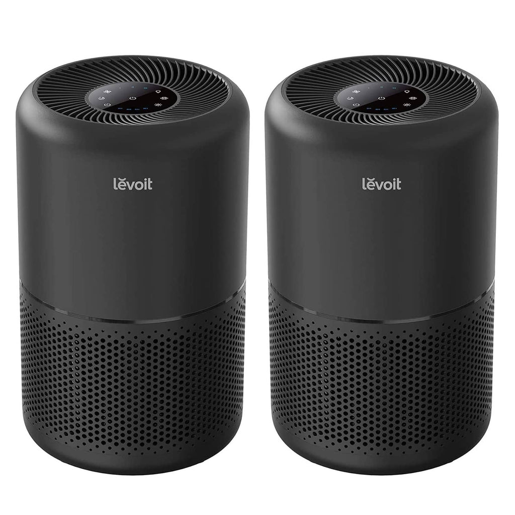 Set of two black air purifiers with circular top vents and mesh intake