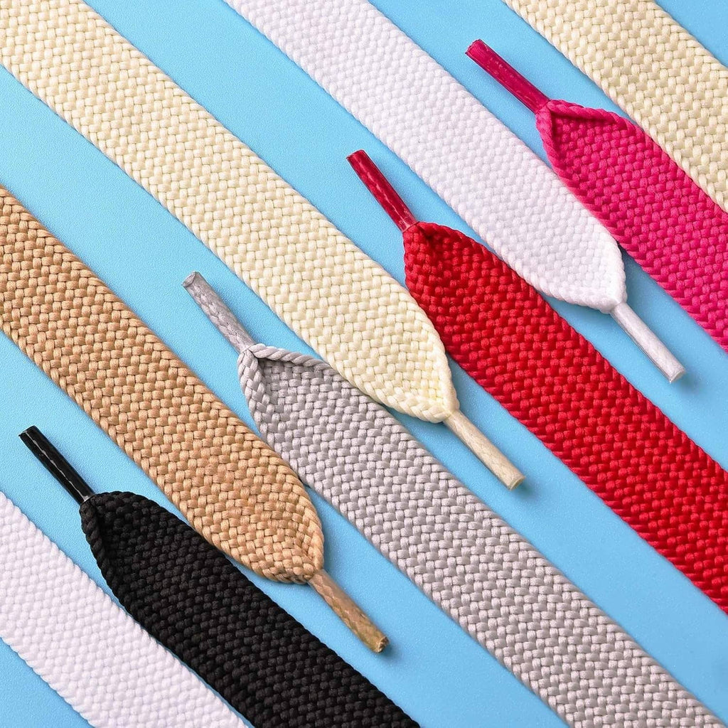 Set of thick flat shoelaces in multiple colors, 3/4-inch wide with plastic tips