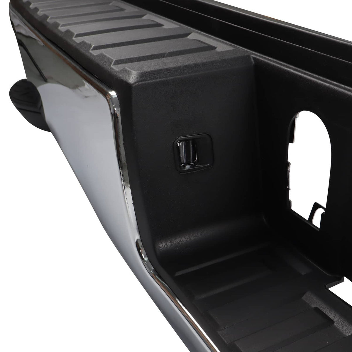 Corner section of chrome rear step bumper assembly with black end cap and step texture