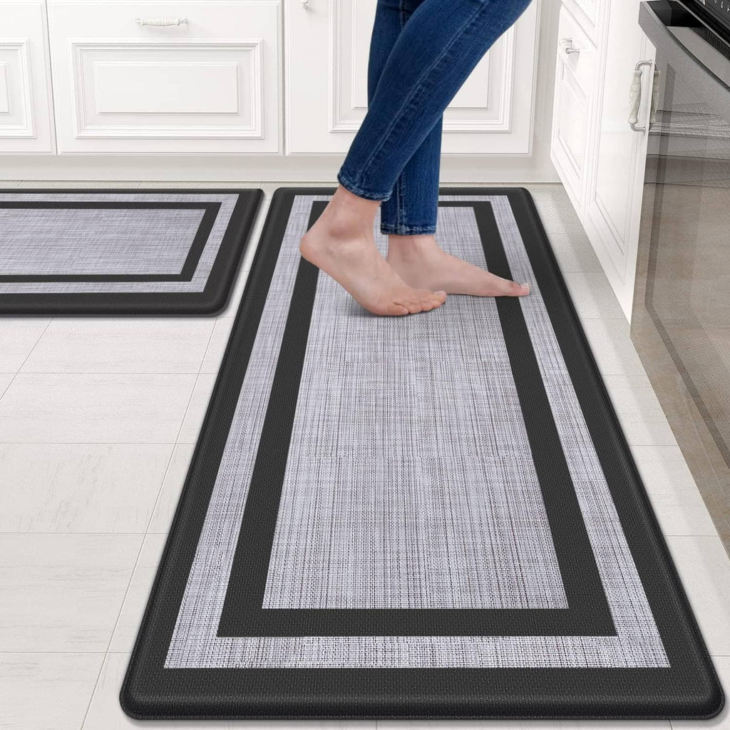 Kitchen mat runner with dark frame and light gray textured center, rectangular border