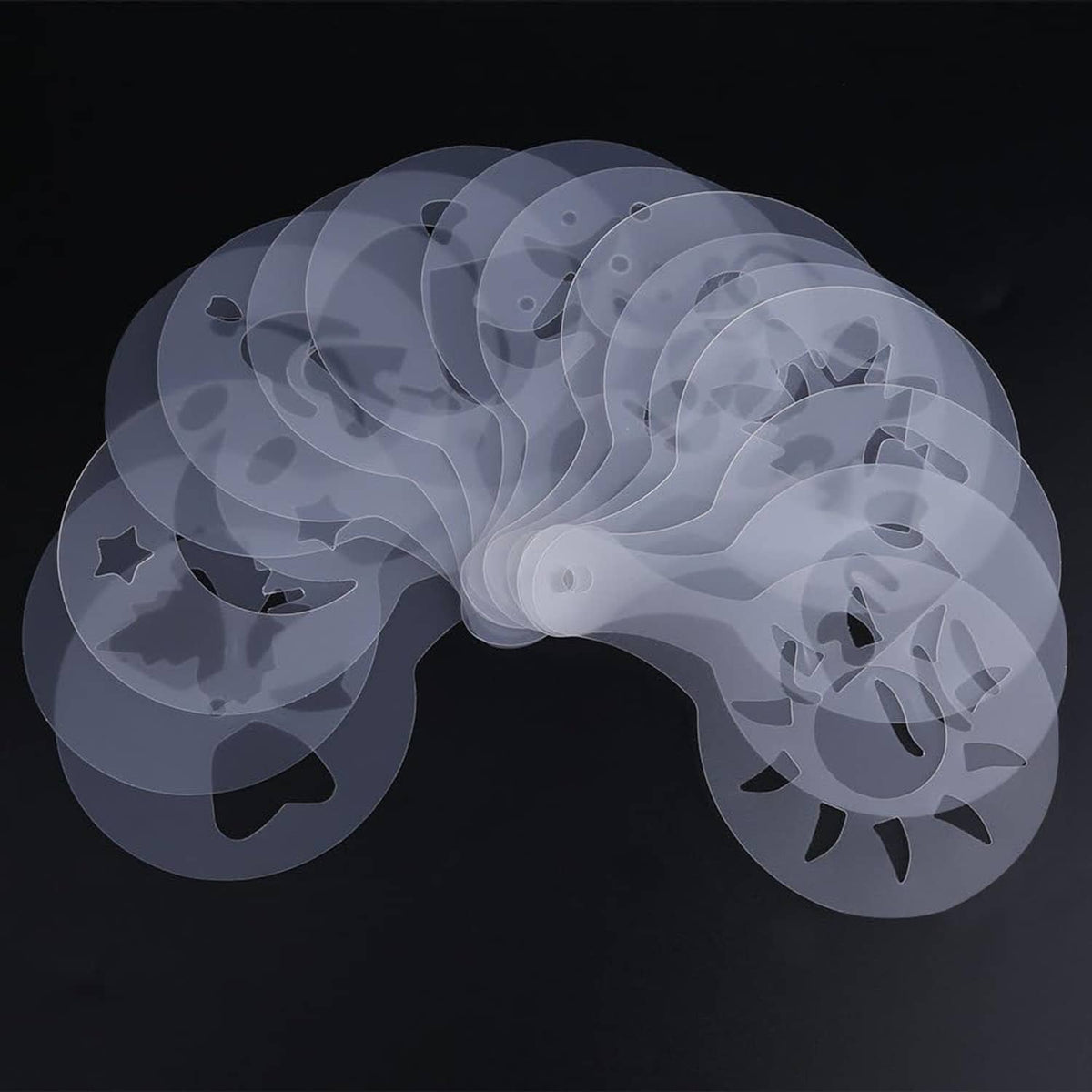 Translucent coffee stencil disc with assorted decorative motifs