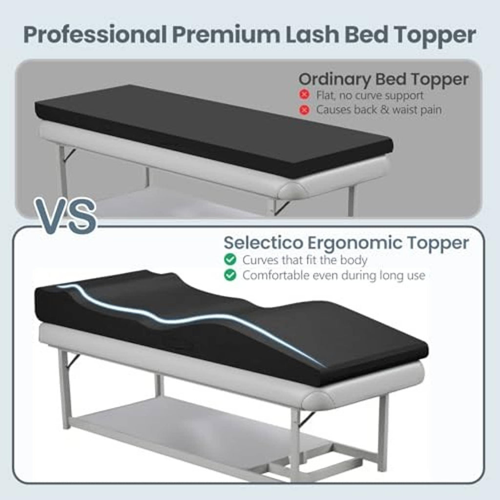 Black ergonomic lash bed topper on massage table, curved profile, cushioned top