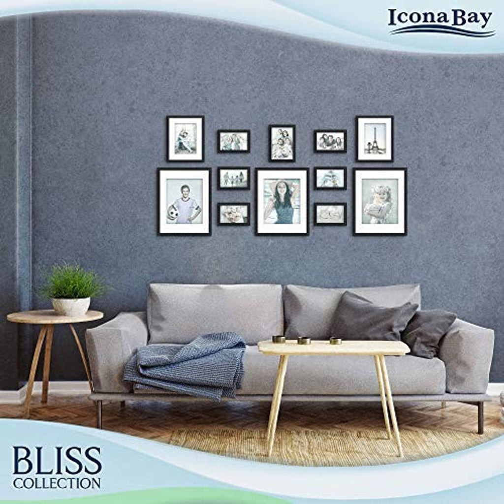 Multiple small black photo frames arranged in a modern grid layout