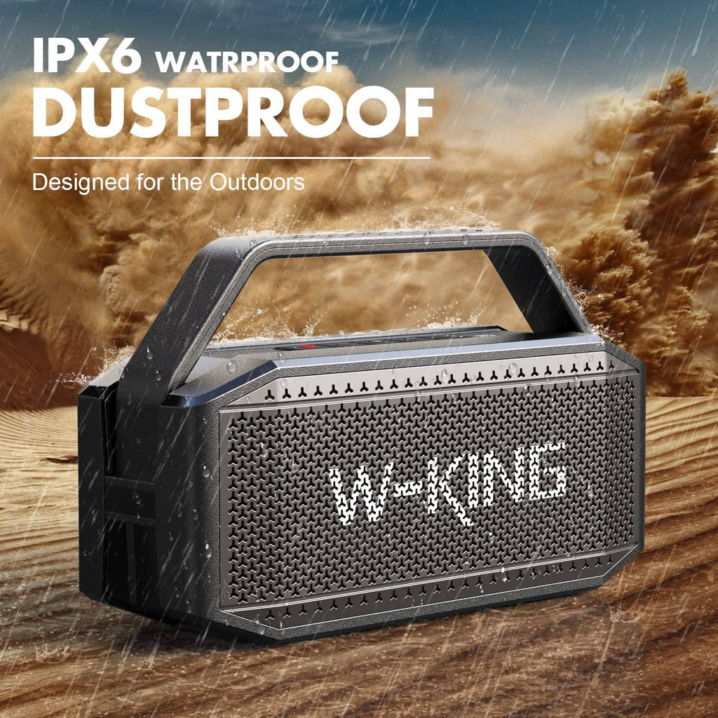 Black portable Bluetooth speaker with carry handle and rugged front speaker grille