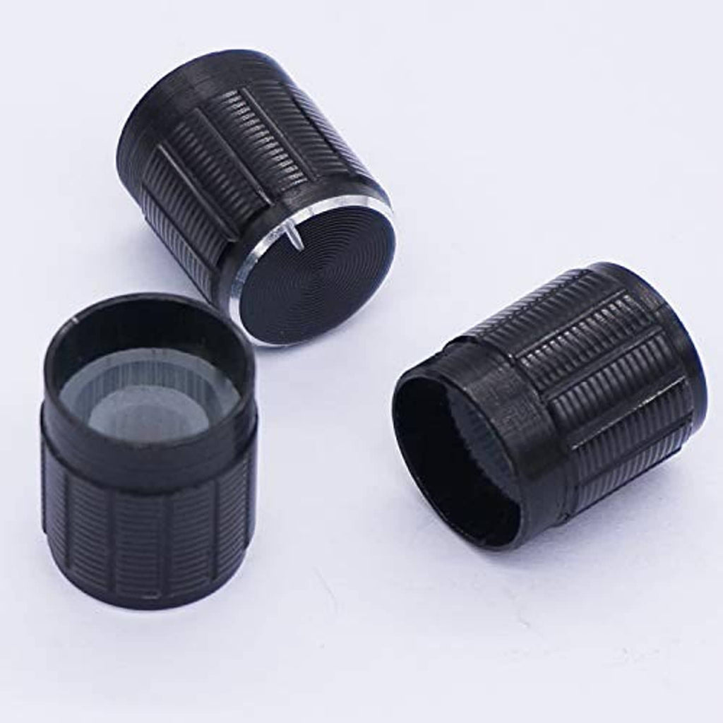 Black textured potentiometer knob housings with ridged grip surfaces