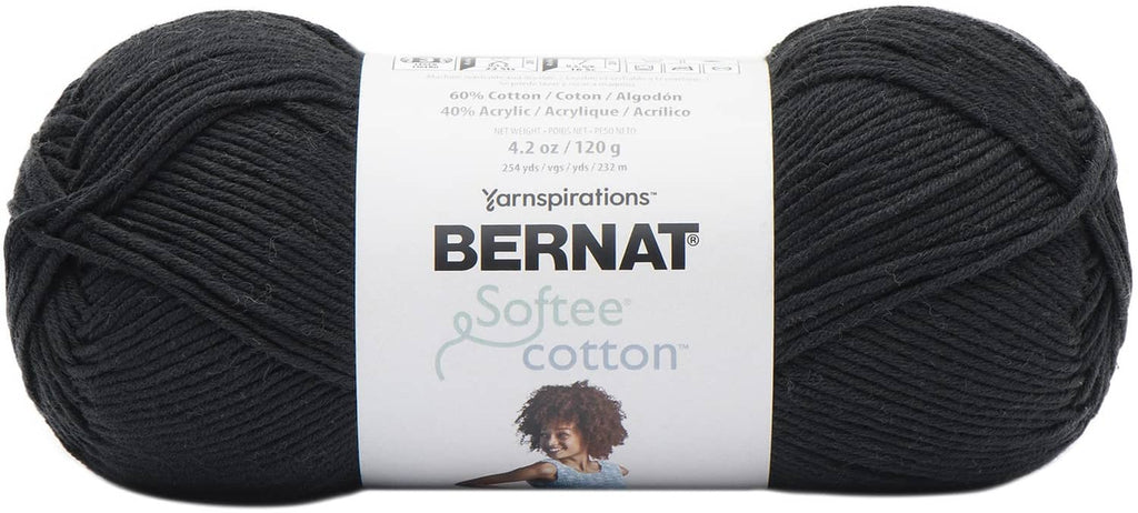 Two dark gray yarn skeins with Bernat Softee Cotton label