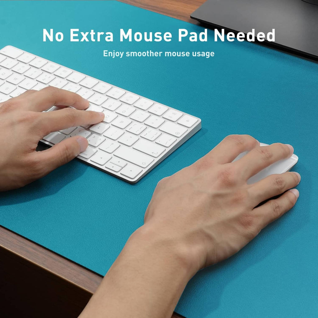Turquoise leather desk pad with smooth surface under keyboard and mouse