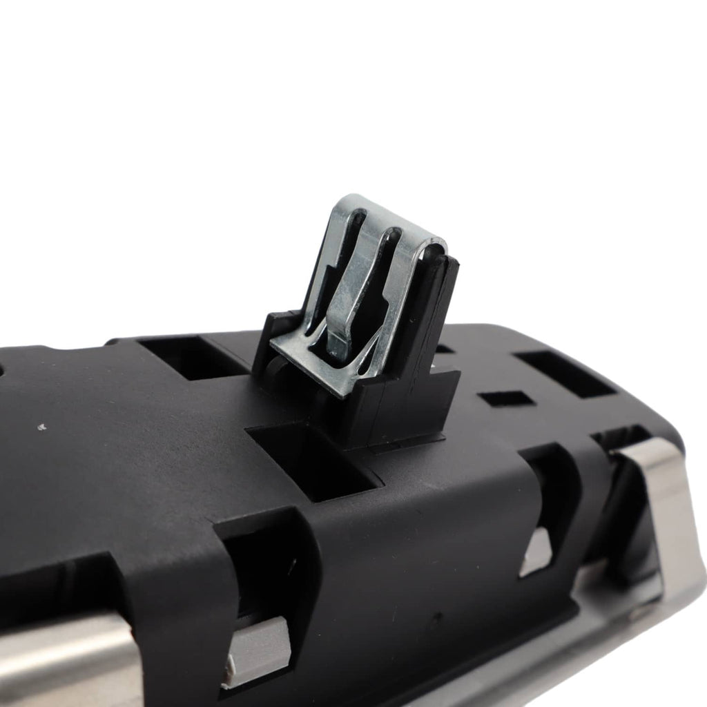 Rear dome light lamp interior close-up of black module and metal bracket