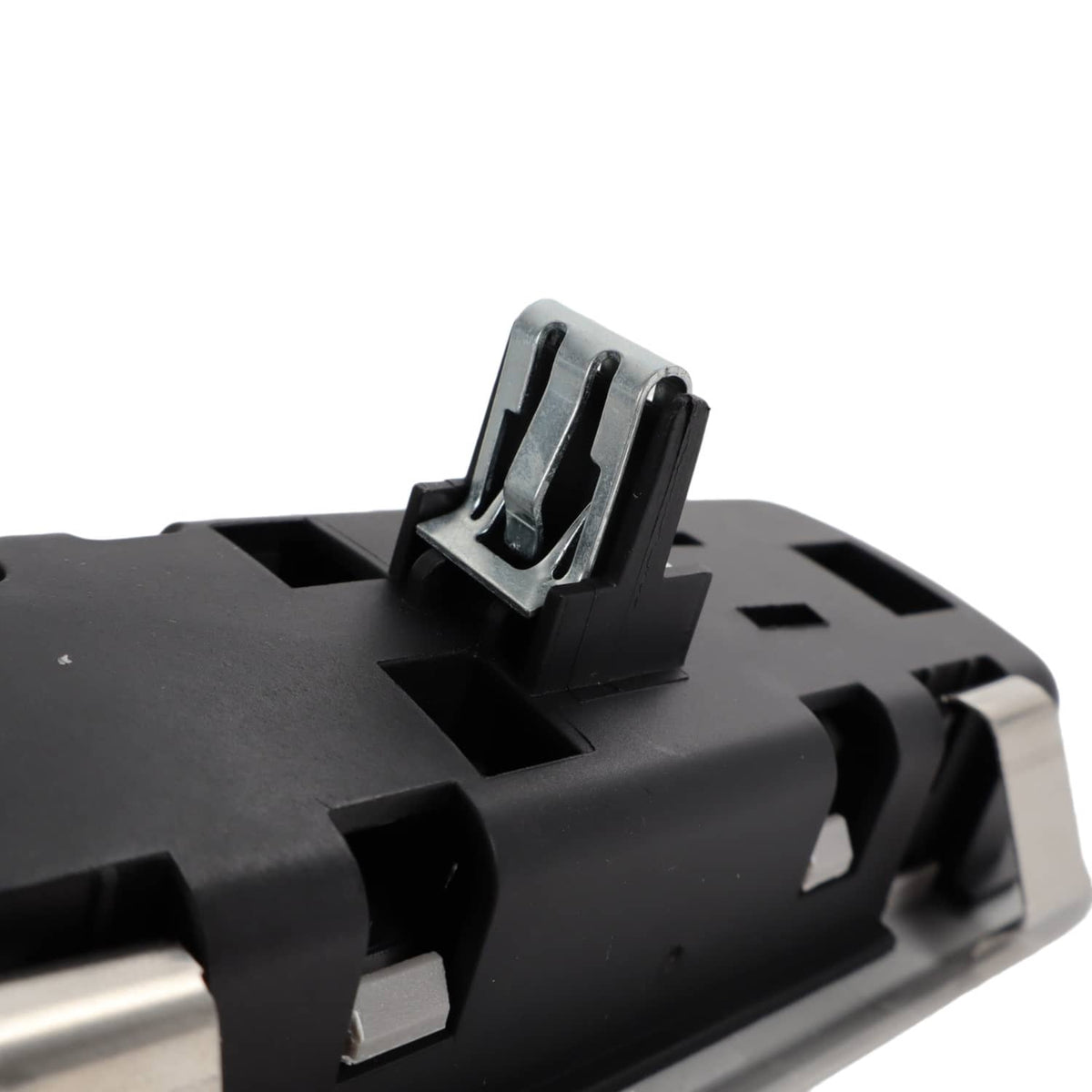 Rear dome light lamp interior close-up of black module and metal bracket