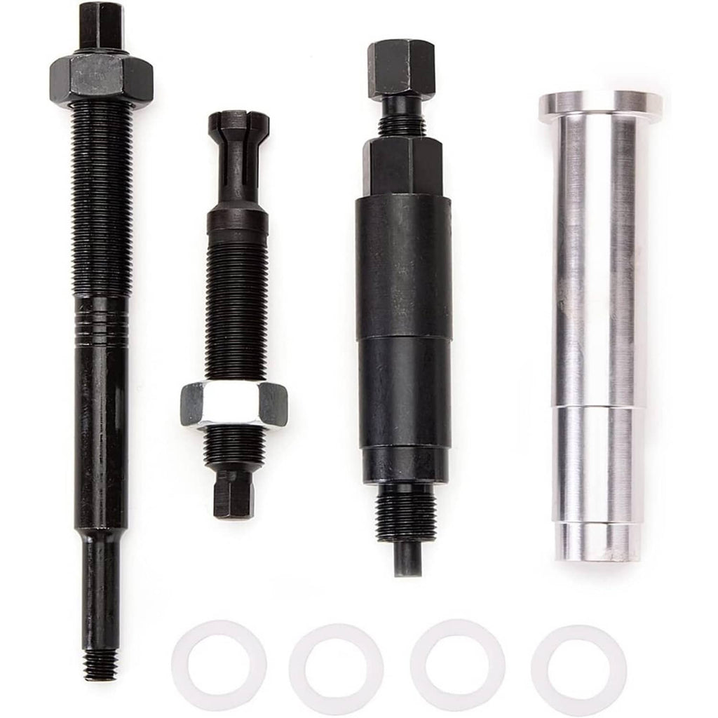 Spark plug remover kit with three pullers, one silver sleeve, and four rings