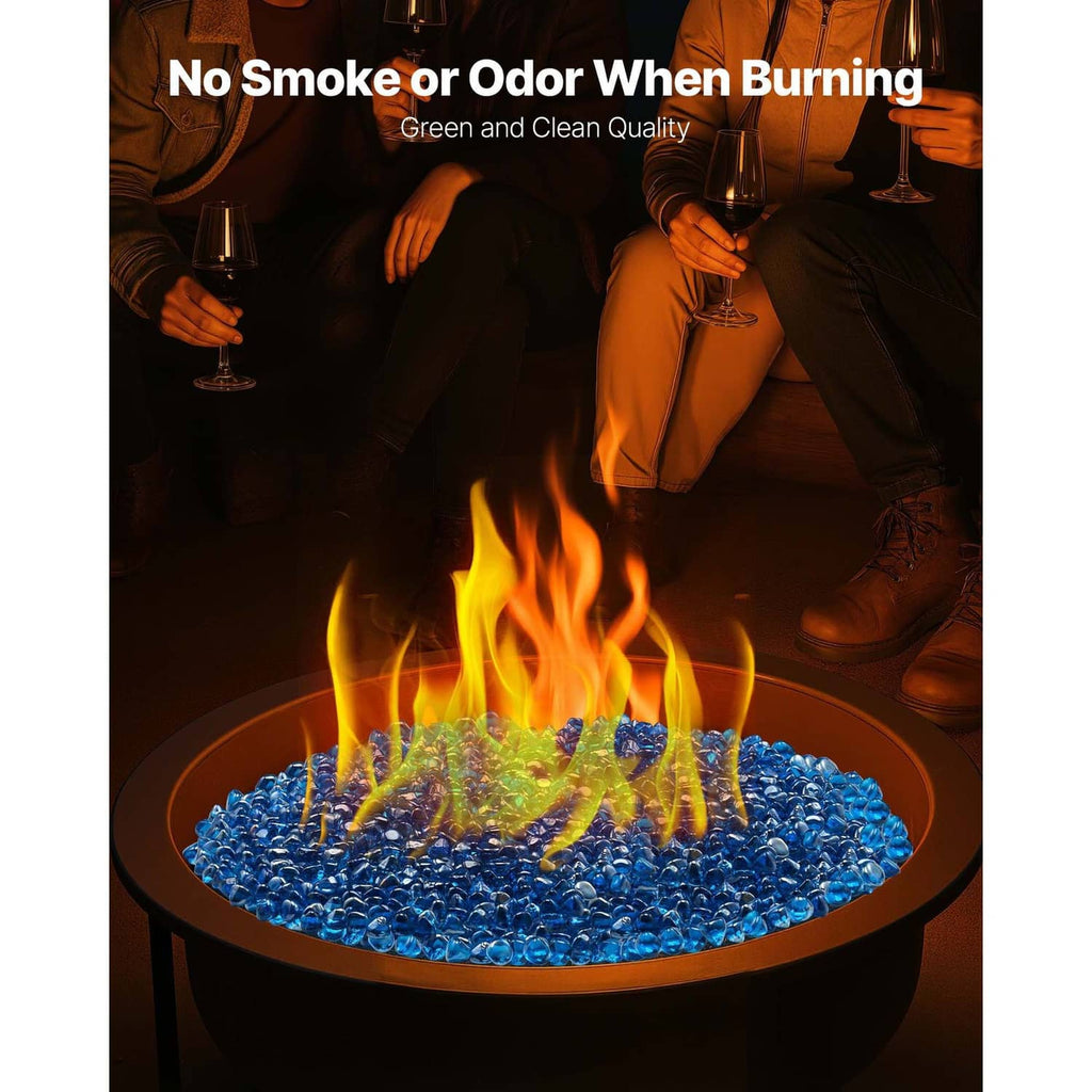 Caribbean blue fire pit glass beads in a round bowl with open flames