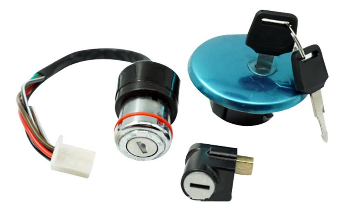 Motorcycle ignition switch lock with keys, teal gas cap with keyhole, and wiring