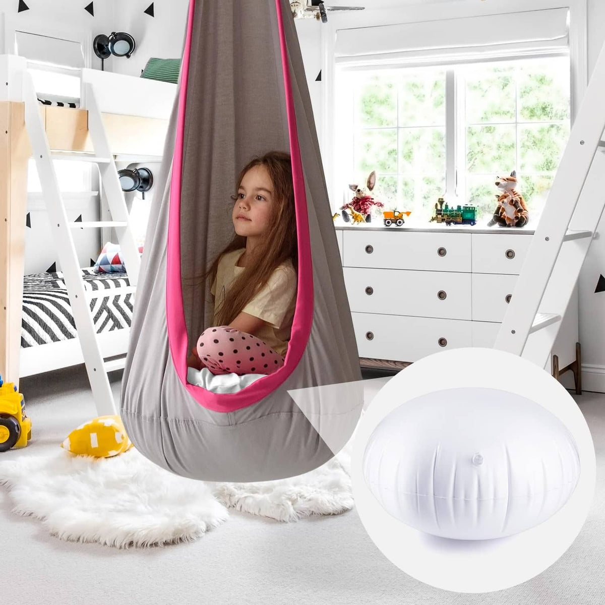 White inflatable pod chair cushion placed on floor, with centered valve