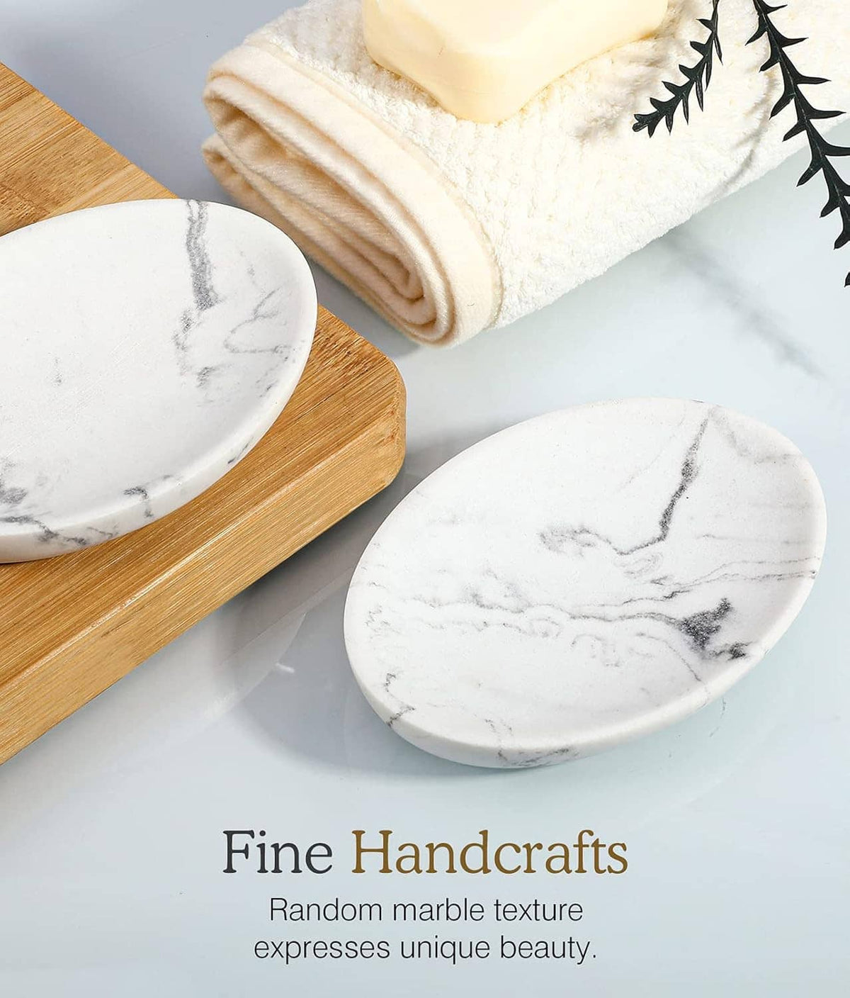 Marble-pattern oval soap dish tray with rolled beige towel and soap bar