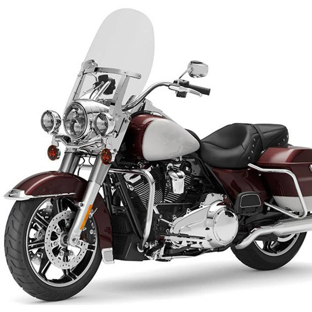 Clear motorcycle windshield with chrome mounting frame on a maroon touring bike
