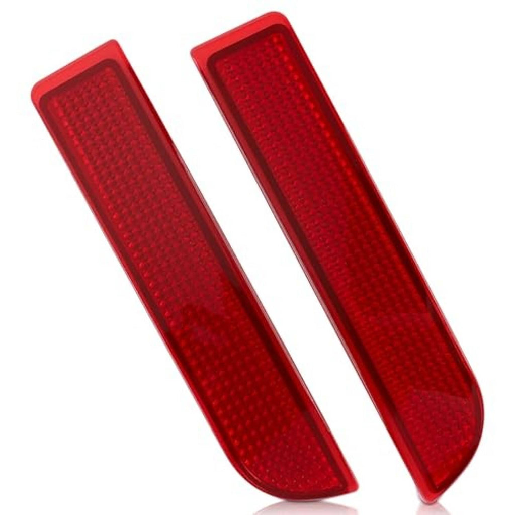 Two red rear bumper reflectors with textured lens, angled view