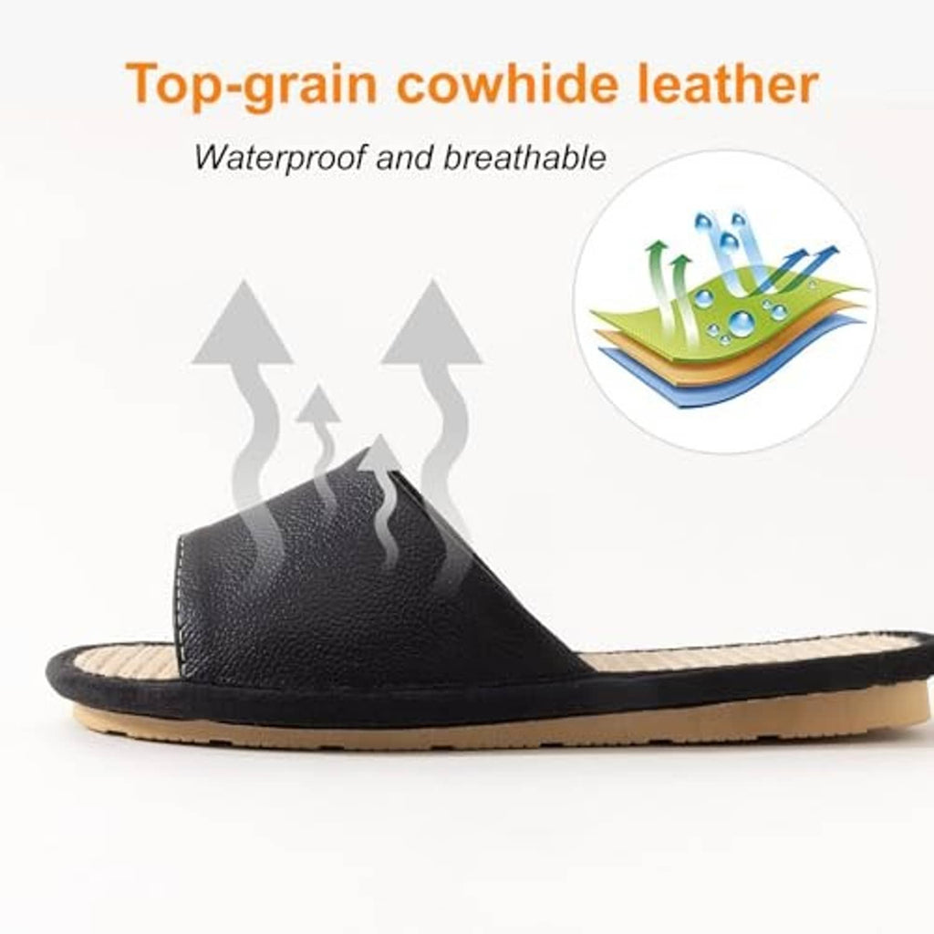 Black leather house slipper with beige woven insole and flat rubber sole, side profile.
