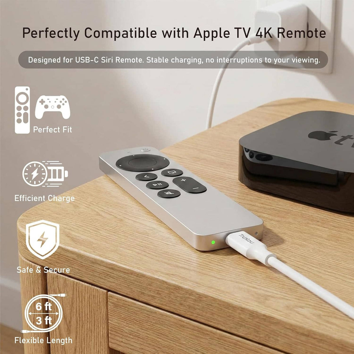 White USB-C charging cable plugged into an Apple TV 4K remote