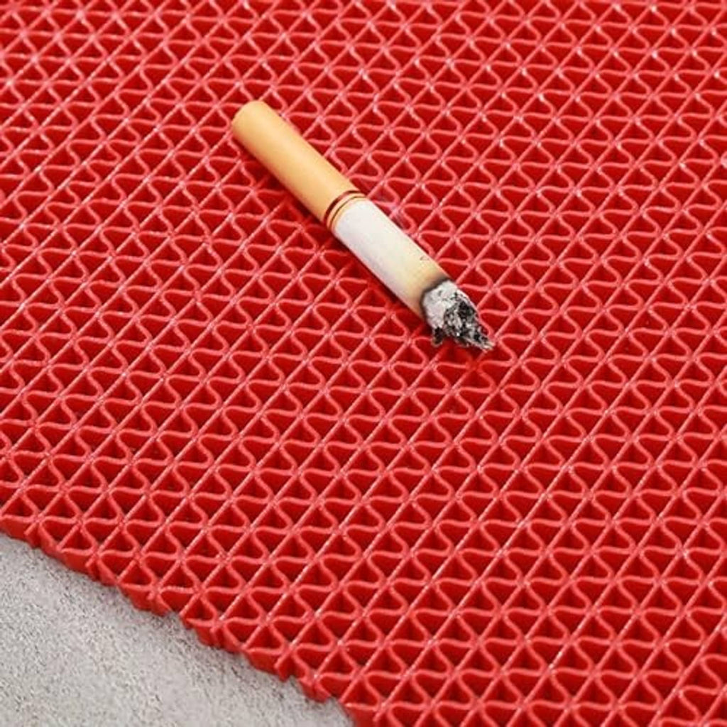 Red PVC pool deck mat with raised diamond grid texture and flexible surface