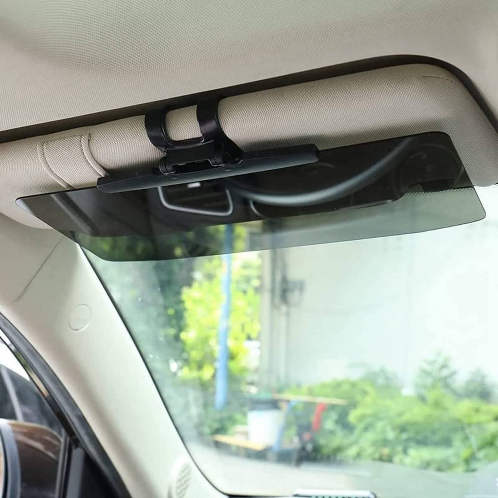 Universal car sun visor extender with dark tinted panel mounted under the visor