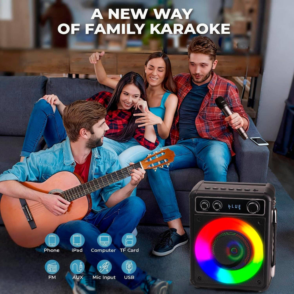 Karaoke speaker with glowing LED ring and a wireless microphone in a group setting