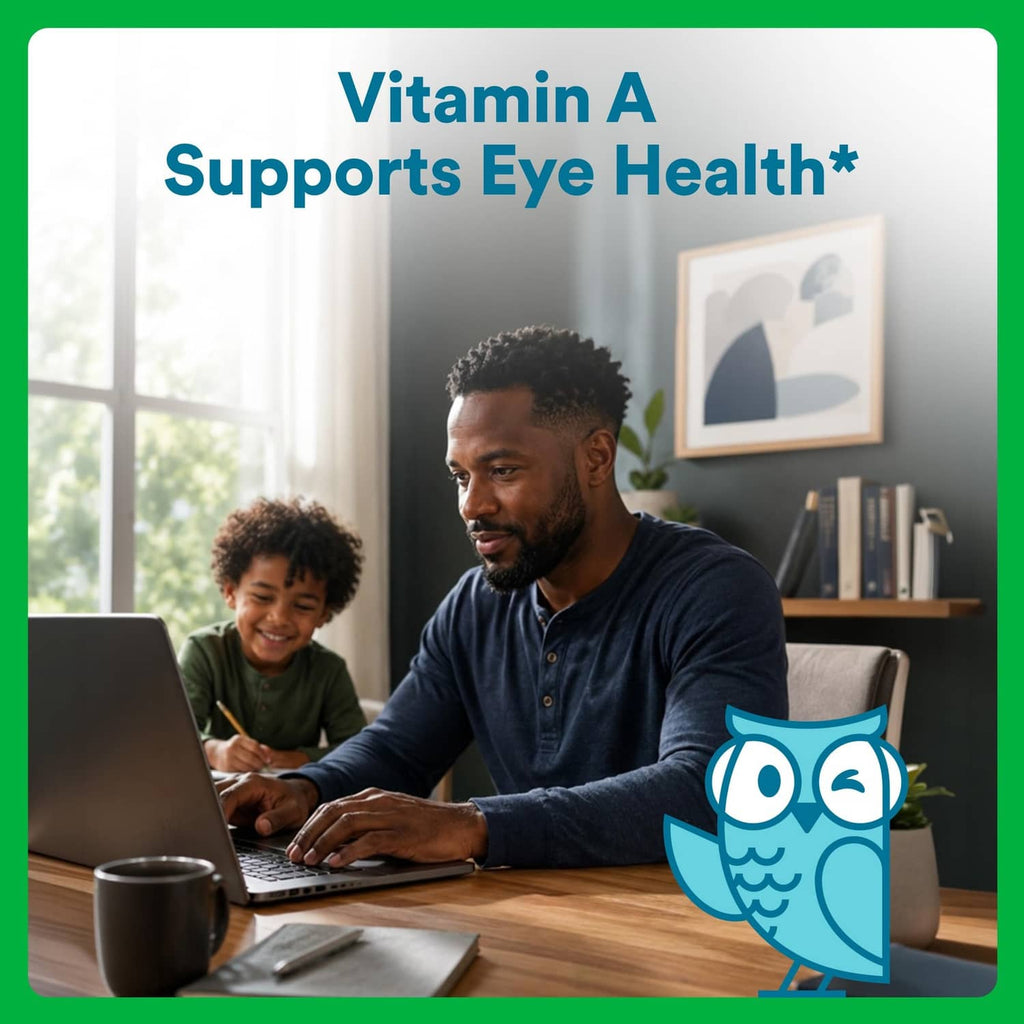 Vitamin A eye health promotional card with man and child using laptop and blue mascot