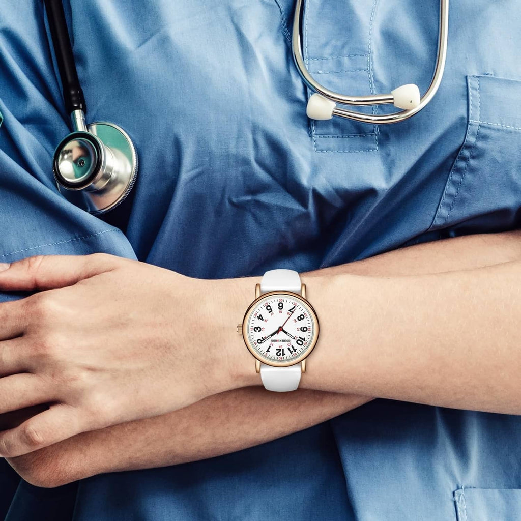 Rose gold nurse watch on wrist with white silicone band and multicolor time dial