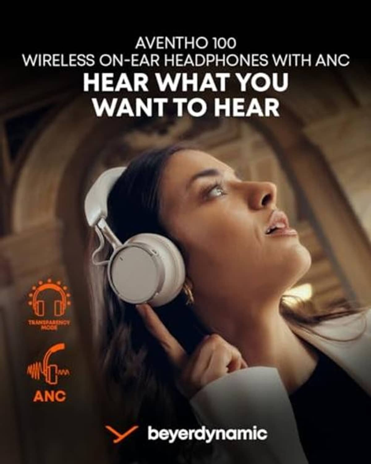 On-ear wireless Bluetooth headphones on a person, white headband and round ear cups