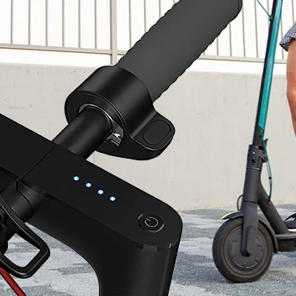 Electric scooter thumb throttle mounted on scooter handlebar, black plastic body