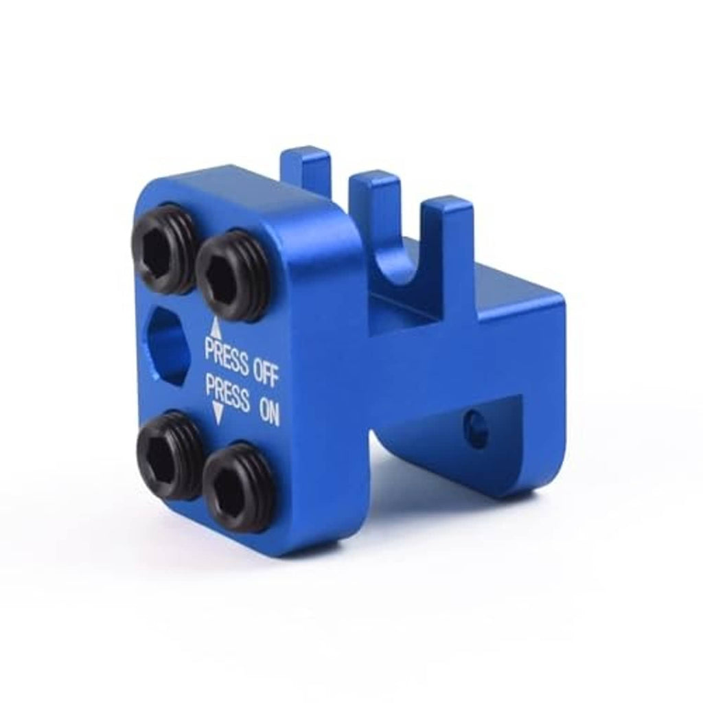 Blue chain link press tool angled view with four black die openings and mounting slot