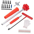 Tire valve stem tool kit with red handles, metal rods, gloves, and valve cores