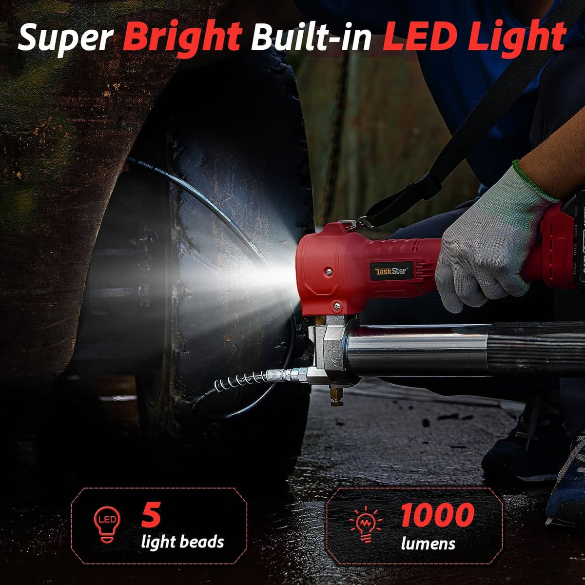 Red cordless electric grease gun with built-in LED light at the nozzle