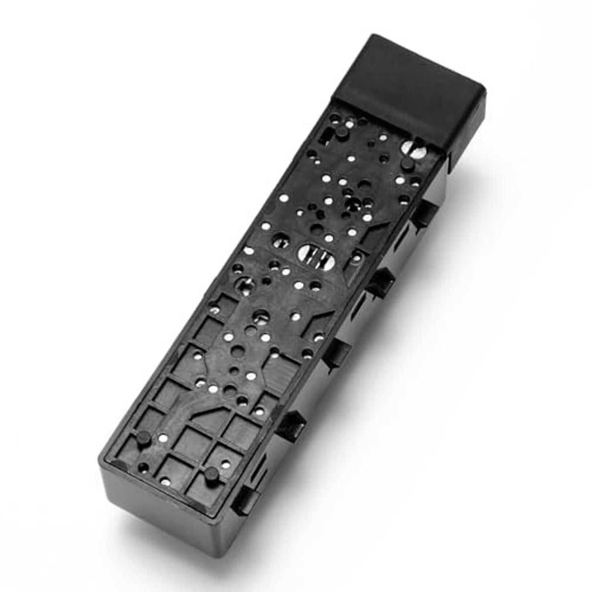 Power seat switch underside with internal connector layout and mounting tabs